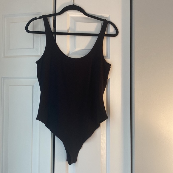NWOT. Woman’s Forever21 black bodysuit. Size large. - Picture 2 of 3